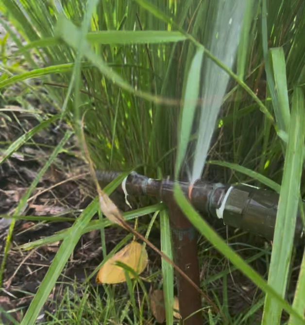 Damaged backflow equipment spraying water